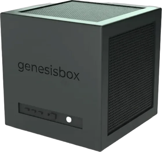 GenesisBox: a compact dark-green metal cube computer